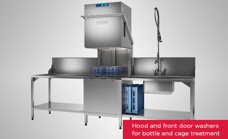 HOBART hood and front door dishwasher in stainless steel with ergonomic loading and unloading tables, designed for hygienic cleaning of bottles and cages, including wash rack and pre-rinse spray.